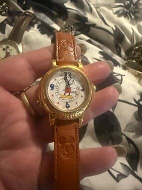 Disney Gold-Tone Musical Mickey Mouse Watch with Brown Strap